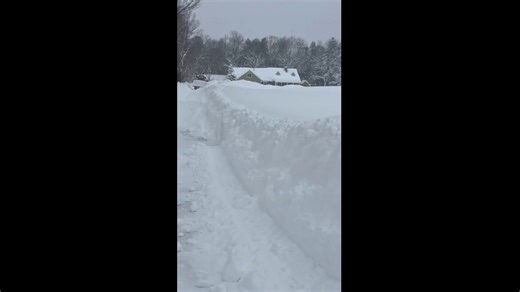 Residents in upstate New York dig themselves out of heavy snow