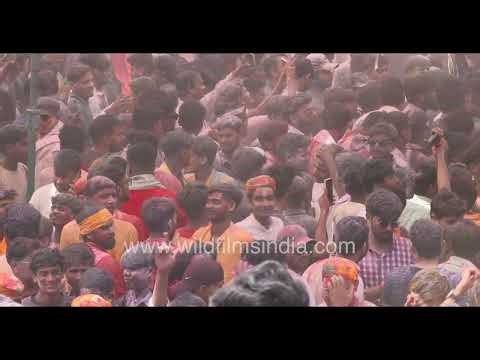 Crowds celebrate Holi festival with colors in India