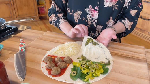 The Pioneer Woman - Ree Drummond puts her twist on the viral tortilla hack by folding pesto, cheese, meatballs, spinach AND banana peppers into a wrap and grilling it! 🤤🤤 Get more recipes from Ree, Saturdays at 10a|9c and subscribe to discovery to stream more episodes of the show: http://discoverypl.us/34WCE6K. #discoveryplus Get the recipe: https://foodtv.com/2R9mVgP. | Food Network