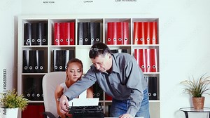 Mechanical repairs old typewriter in the office