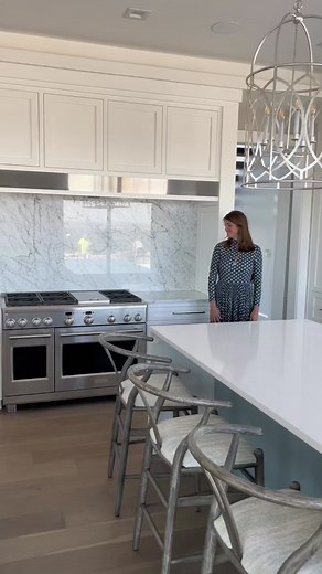 Innovative Kitchen Design with Hidden Pantry and Garage Access