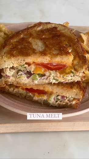 the best tuna melt. this sandwich is perfection as is but if you want to take it to the next level, easy: add potato chips. here’s the recipe! 1 tomato, sliced and salted (put it on a paper towel so it drains a bit of its liquid) 2 ribs of celery, finely diced 1/4 red onion, finely minced 3 tablespoons minced dill 1 can of tuna (mine was packed in water but tuna in olive oil also works) i used @wildplanetfoods Juice from 1 small lemon 1 teaspoon Dijon mustard 2 tablespoons good quality mayonnais