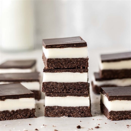 1.9K views · 47 reactions | Chocolate Peppermint Slice  RECIPE https://recipesbycarina.com/peppermint-slice/ A crumbly chocolate base, sweet peppermint filling and a decadent chocolate topping make up this Peppermint Slice. It’s incredibly delicious and so easy to make! | Recipes by Carina | Facebook