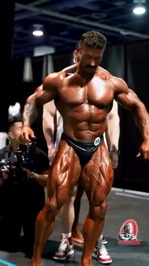 74K views · 493 reactions | Olympia Backstage @cbum #flashbackfriday PURCHASE OLYMPIA TICKETS ✅ mrolympia.com  **Dates:** October 9-12, 2025  **Location:** Las Vegas, Nevada  by @_capturedbychris_ @mrolympiallc @cbum @jake_wood_media @dansolomon_official @ifbb_pro_league #mrolympia2023 #hadichoopan #reels #classicphysique #fit #posing #viral #cbum #bodybuilding #gym #mrolympia #posing #ifbbproleague | Mr. Olympia LLC | Facebook