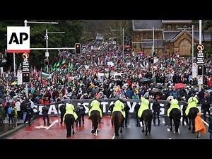 Thousands march across Sydney Harbour Bridge in support for Palestinians in Gaza