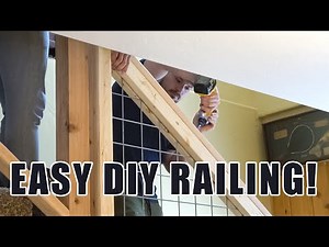 WE BUILT A RAILING OUT OF 2X4'S AND HOG WIRE!