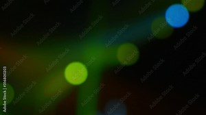 Rack focus shot of moving heads hanging on truss in a concert hall before a live music event.