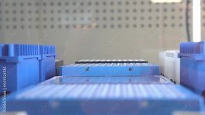 Automation in the clinical laboratory. Pipetting robot laboratory. Medicine robotics. automated pharmaceutical laboratory. Research and science background