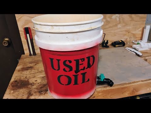 Putting together a waste oil bucket