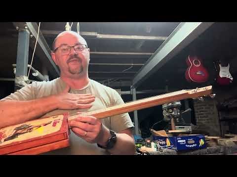 Nut height and string intonation on a cigar box guitar