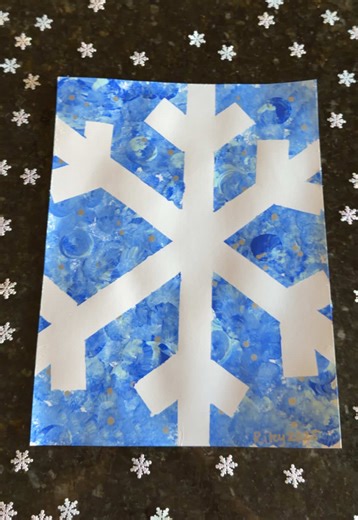 Snowflake stencil! ❄️ My toddler had so much fun with this one and we listened to her favorite song while doing it 😂 Such a fun and easy winter craft for kids! #wintercrafting #kidscrafts #sensoryplay #easycrafts #winteractivities