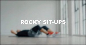Rocky Sit-ups are great for core exercises targeting the abs and obliques! Turn on Eye of the Tiger and you might find yourself doing these all the time!⠀ ⠀ Here are some pointers on Rocky Sit-ups⠀ ⠀ • Hands behind head⠀ • Contract core and sit-up•⠀ • At the top bring right elbow to left knee, and then left elbow to right knee⠀ • Return to starting position⠀ ⠀ www.open-gym.com | Brooks Laich