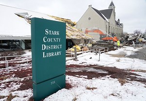 Out with the old. Crews begin demolishing former Stark Library in downtown Canton