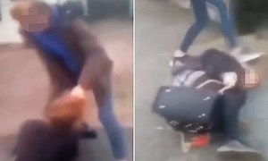 Video shows two teenage 'bullies' punching and stamping on girl, 12