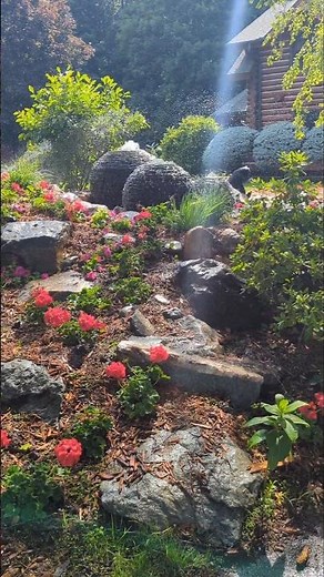 Peaceful front yard pond, waterfall & fountains in Minnesota, built for calm, beauty & connection.