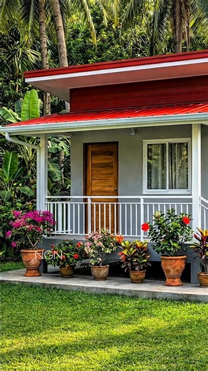 Nathaniel Guevarra Navarro on Instagram: "🇵🇭This home interior features clean, durable materials with warm wood floors and furniture, solid cabinetry, and simple modern fixtures. Soft gray and white walls are balanced with natural beige tones and gentle green accents, creating a calm and inviting atmosphere. Large windows allow natural light to flow in while showcasing a refreshing outdoor view, making the space feel bright, comfortable, and naturally connected to its surroundings. #NGN"