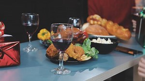 Download A table with wine glasses and food for free