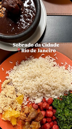 Via Saudade on Instagram: "Feijoada is not just a dish, it’s a culture. 🇧🇷🍲 The dish has deep roots in Afro-Brazilian history. Feijoada was created by enslaved Africans, who cooked black beans, grains, and the cuts of meat rejected by plantation owners, turning scarcity into nourishment, and necessity into tradition. What began as survival became one of Brazil’s most powerful culinary symbols. Over time, feijoada became a ritual. That’s why it’s traditionally served on Wednesdays and Saturday