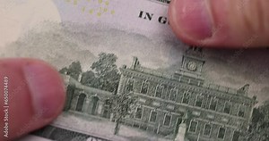 One hundred American dollars close-up, American genuine cash with a face value of one hundred dollars