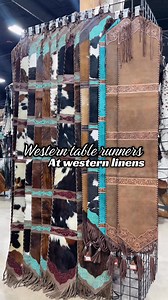 Add a touch of western charm to your table with our tooled leather & cowhide table runners.🌵 Available on our website. Western-linens.com | Western Linens