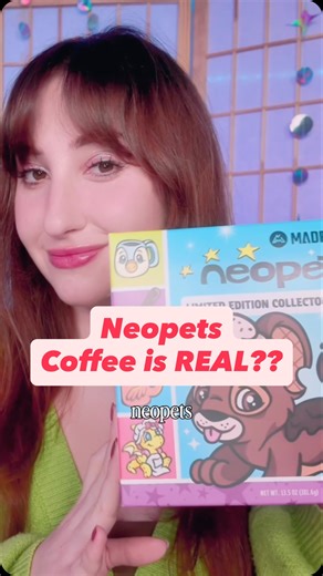 Vi ✿ | NYC Cosplayer on Instagram: "don't you love a nostalgic AND tasty collab? This @neopetsofficialaccount and @madrinas coffee collab really brings the Coffee Cave to life 🥹 you can find my full in-depth review on yt! Would you drink ice cream sandwich flavored iced coffee? #neopets #y2knostalgia #neopetsmerch #madrinas #madrinascoffee #coffeereview #neopets4lyfe #2000saesthetics"