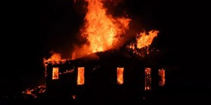 Crews fight Kentucky house fire after passerby finds home engulfed in flames