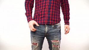 Man scratching crotch on white background, closeup. Annoying itch