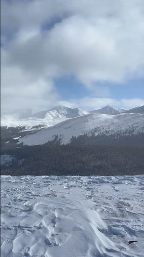 On Top of the World: Snowmobile Adventure with Stunning Colorado Mountain Views