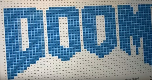 Doom running in task manager with each CPU core as a pixel, supposedly