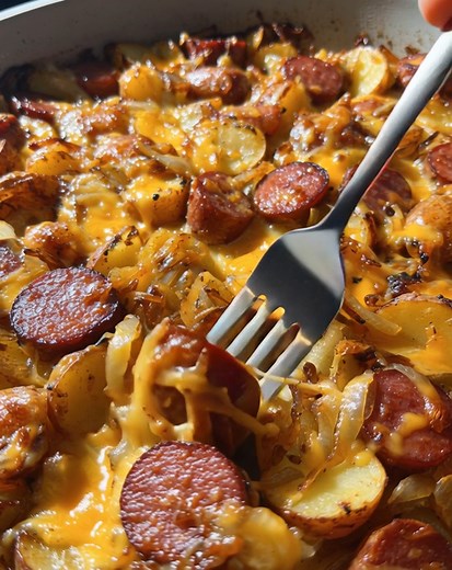Smoky, cheesy, and irresistibly hearty! 🧀🥔🌭 This Cheesy Smoked Sausage and Potatoes Skillet combines tender potatoes, savory smoked sausage, and melted cheese — all cooked together in one pan for a cozy, flavor-packed meal! 😍 .............. Full Recipe in Coʍmеոτ 💬👇 | Recipes with Me