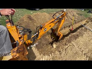 Digging Garage Footings w/ Davis D100 Back Hoe on a John Deere 317 Skid Steer. Custom House Build.