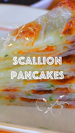 My Favorite Scallion Pancakes! 🔥🤩 📝 Full Video Printable Recipe: https://cicili.tv/scallions-pancakes/ Serves 4 pancakes Prep time: 1 hour Rest time: 40 minutes Cook time: 20 minutes For the pancakes: 2 cups plus 1 tablespoon all-purpose flour, divided 1 teaspoon salt, divided 3/4 cup warm water (140°F) 1/4 cup vegetable oil 4 scallions, green part only, minced For the dipping sauce: 2 tablespoons soy sauce 2 tablespoons rice vinegar 1 teaspoon sugar 1/2 teaspoon sesame oil 1/2 teaspoon red p