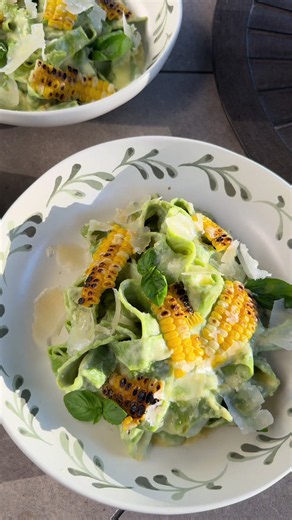 When you have an abundance of corn and spinach, you make fresh spinach pasta with a silky, creamy corn sauce. Add a handful of fresh basil and voilà—you’ve got a beautiful bowl of summer. Pair it with homegrown tomatoes, peppery arugula tossed in a fresh herb balsamic vinaigrette, toasted pine nuts, and Gorgonzola, and you’ve got the perfect summer meal. Yes… this one’s going in the cookbook.