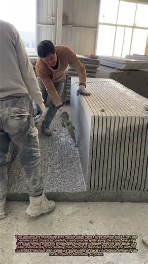 Separating Gray Marble Slabs from a Large Block by Skilled Workers