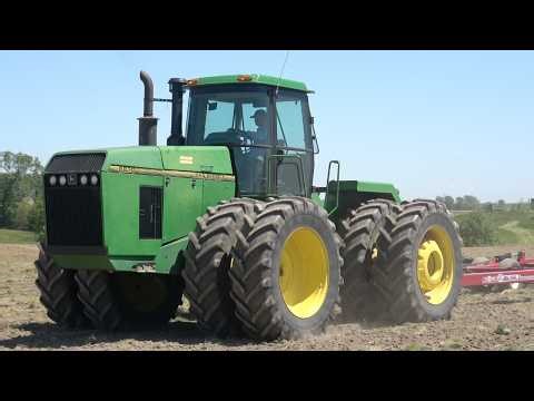 JOHN DEERE 8870 Tractor Working with a 50ft Harrow
