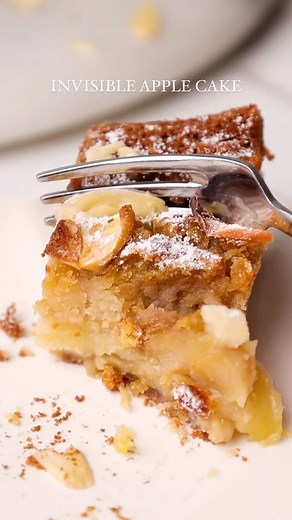 Rosie Brown on Instagram: "Vegan Gâteau Invisible (Invisible Apple Cake) 🤎 Layers of thinly sliced apples bound in a sweet, custardy batter. Whilst baking the apples disappear into the batter for a delicious apple-filled dessert that has more fruit than cake. It’s packed with protein and fibre - perfect to enjoy any time of day from breakfast to brunch, to dessert. 400g soya yoghurt 240ml dairy free cream 1 tsp vanilla extract 40g cornflour 80g brown sugar 80g plain flour 40g vegan vanilla prot