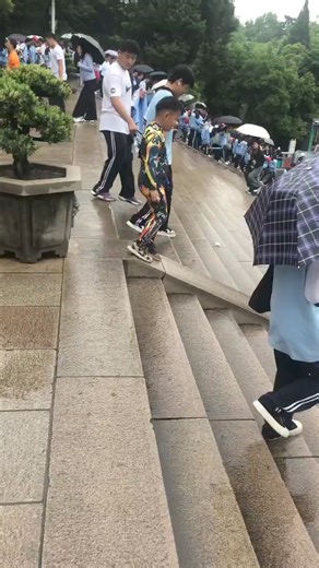 2.6M views · 6.9K reactions | Watched a kid slide down the stairs—it was hilarious, pitiful, and adorable all at once!  #KidsBeingKids #travel | In Zhejiang | Facebook