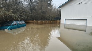 Burlington homes surrounded by water after Gages Slough floods area
