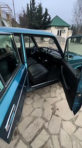 Vintage Blue Car Tour: Classic Design and Luxurious Interior