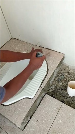 Easy way instaling tile around squat toilet