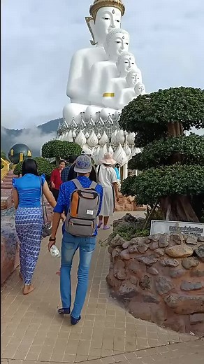 Exploring a Stunning Outdoor Statue with Scenic Backdrop