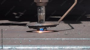 closeup view of the gas burner of a industry cnc metal cutting machine