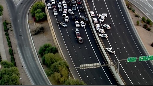 Man with gun slumped over in car shut down SR 51 in Phoenix on Wednesday night
