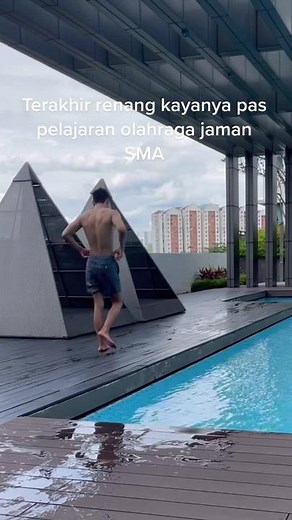 Exploring an Infinity Pool with a Muscular Male Model