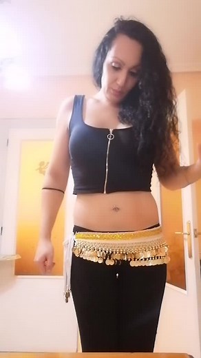 Belly Dance Performance in Stylish Attire