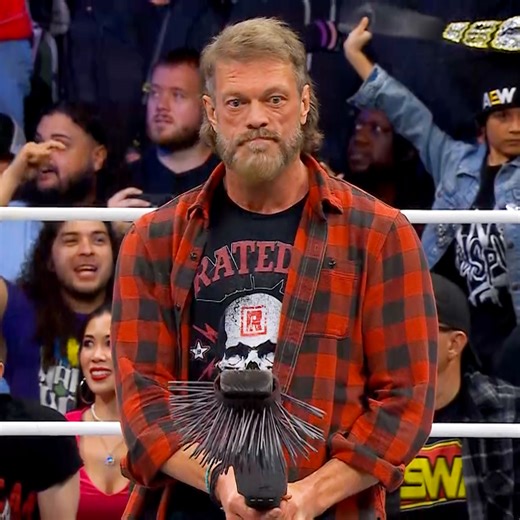 #OnThisDay in 2025: Adam Copeland tried to free the AEW World Title from the Death Rider's briefcase, but Jon Moxley wasn't having it! 😤 | All Elite Wrestling