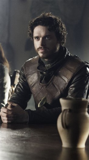 Game Of Thrones | House Of The Dragons on Instagram: "“The Young Wolf — born of honor, bound by vengeance. In the cold winds of the North, Robb Stark — the Young Wolf — rides through the mist with the direwolf Grey Wind at his side. His armor bears the sigil of House Stark, the direwolf gleaming silver against the grey steel. The banners of the North ripple behind him, men chanting his name: “The King in the North!” Snow drifts across the battlefield as he surveys the land soaked in blood and ho