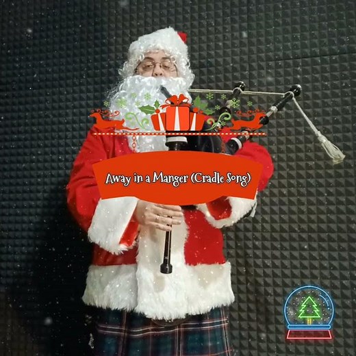 AWAY IN A MANGER (CRADLE SONG) - Santa playing the bagpipes