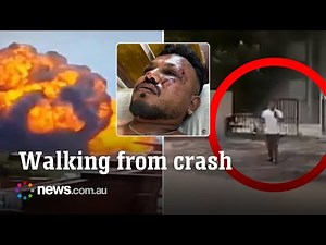 New vision shows survivor walking from Air India fire