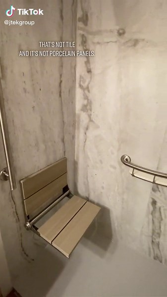 These Trinity walls from Samuel Mueller are so luxe! Get the look and feel of porcelain panels for less! #cantonohio #FindYourEdge #northcantonohio #akron #remodel #showerdesign #tile #fyp